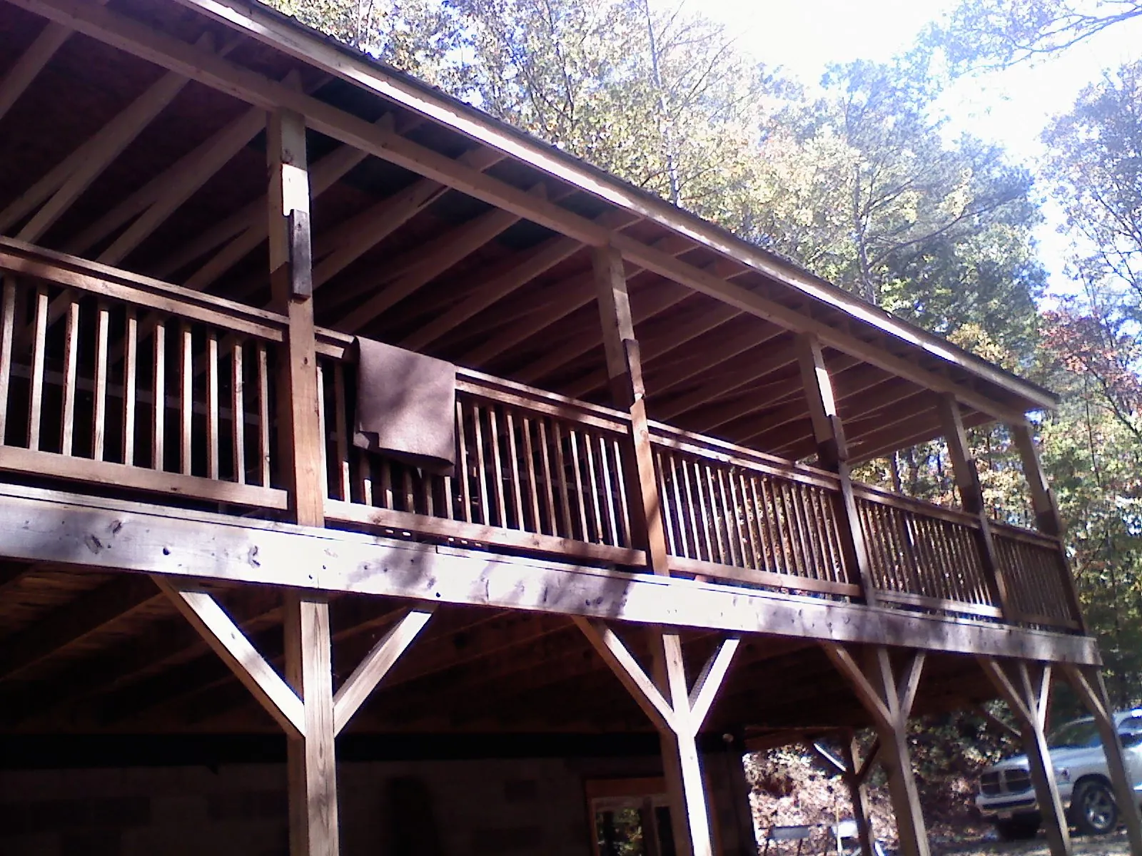 Timber framing under a new elevated porch and deck — Roof Leak Repair in Pavilion by Roofing Brothers